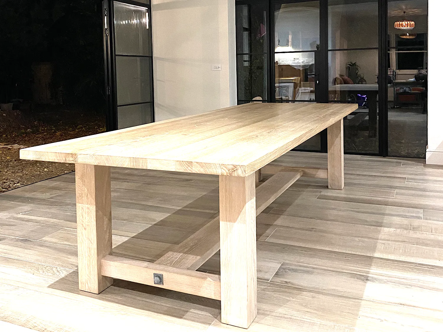 A handmade oak refectory table, one of the quality pieces destined for auction