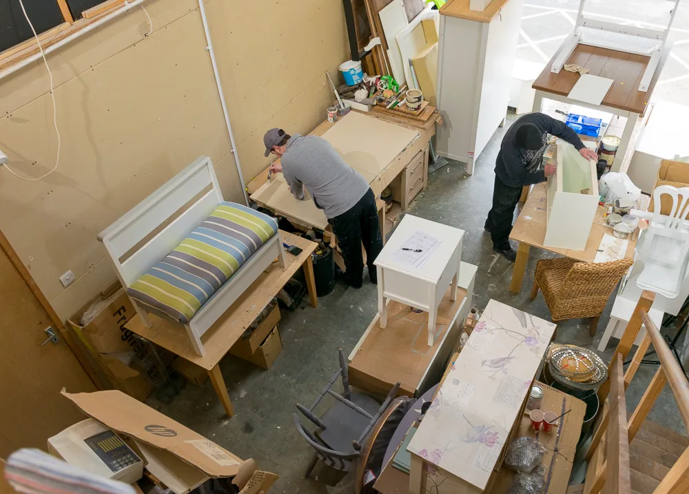 Looking down over the benches in the Doncaster Refurnish workshop
